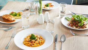 Breakfast, lunch, dinner served; local and international cuisine