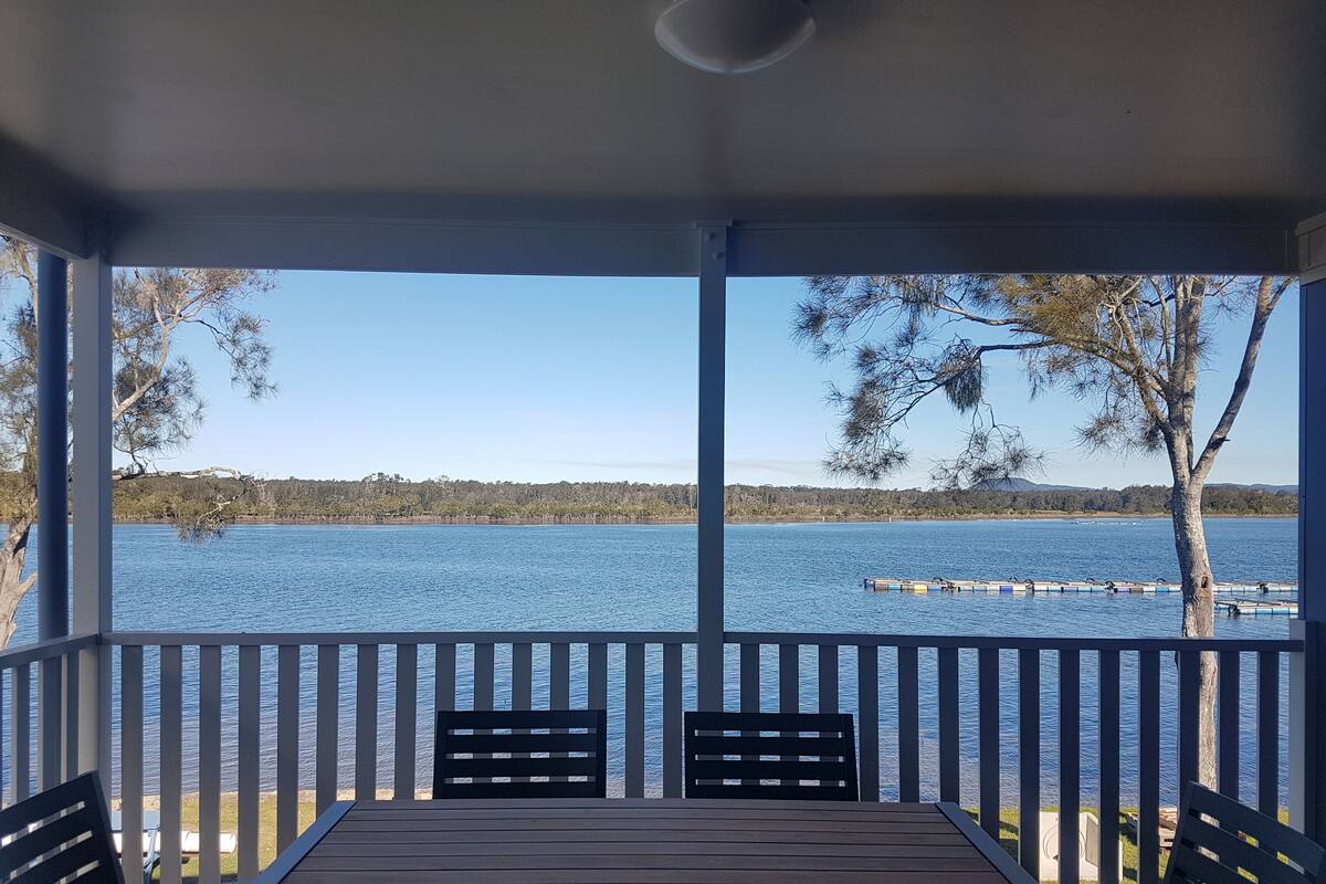 Deluxe Two Bedroom Riverfront Cabin | Balcony