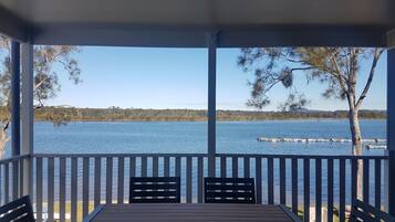 Deluxe Two Bedroom Riverfront Cabin | Balcony