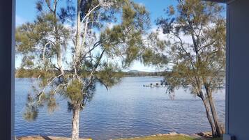 Deluxe Riverfront Cabin | Water view