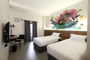 Deluxe Triple | Premium bedding, in-room safe, desk, iron/ironing board - U Hotels Makati (Makati)