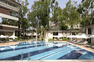 Indoor pool, seasonal outdoor pool, pool umbrellas, sun loungers
