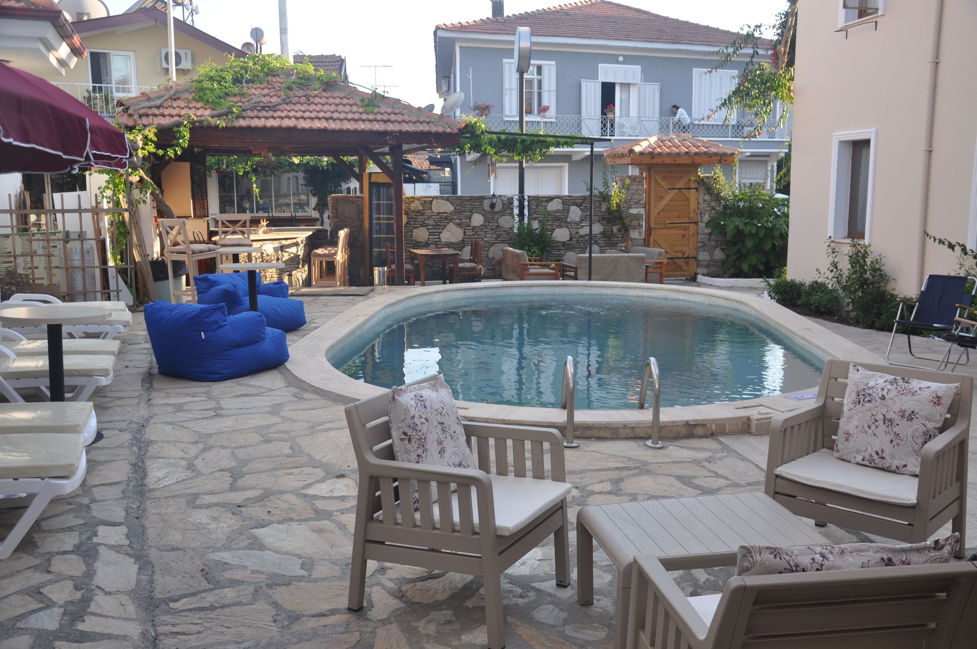 outdoor pool, pool umbrellas, pool loungers