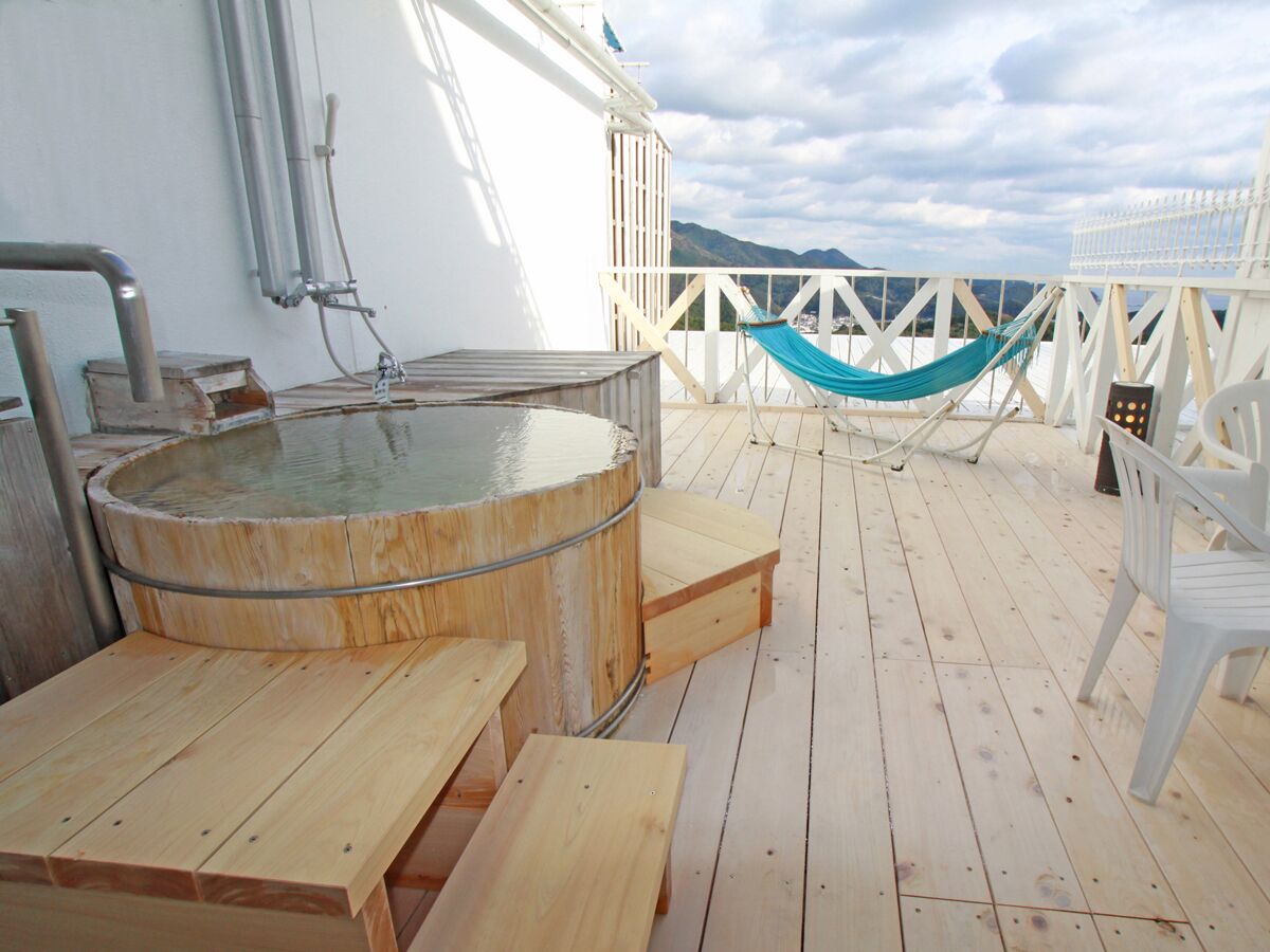 japanese style room with private open-air bath, non smoking | bathroom | slippers, electronic bidet, towels