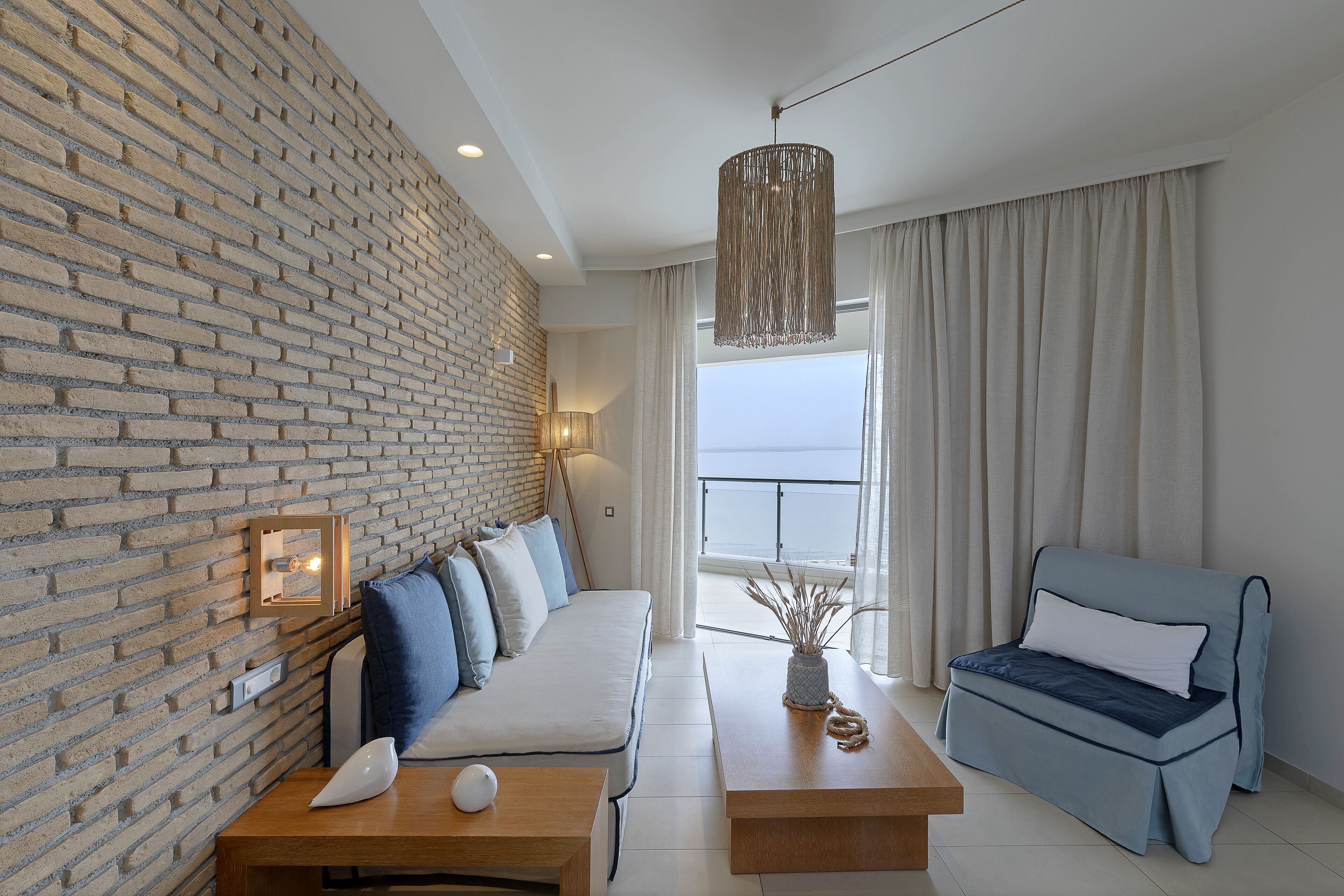 junior suite, sea view | living area | 40-inch smart tv with satellite channels, tv