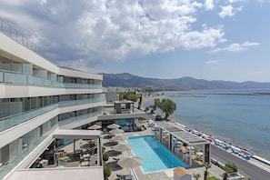 On the beach, sun-loungers - Anastasia Hotel & Suites Mediterranean Comfort (Karystos)