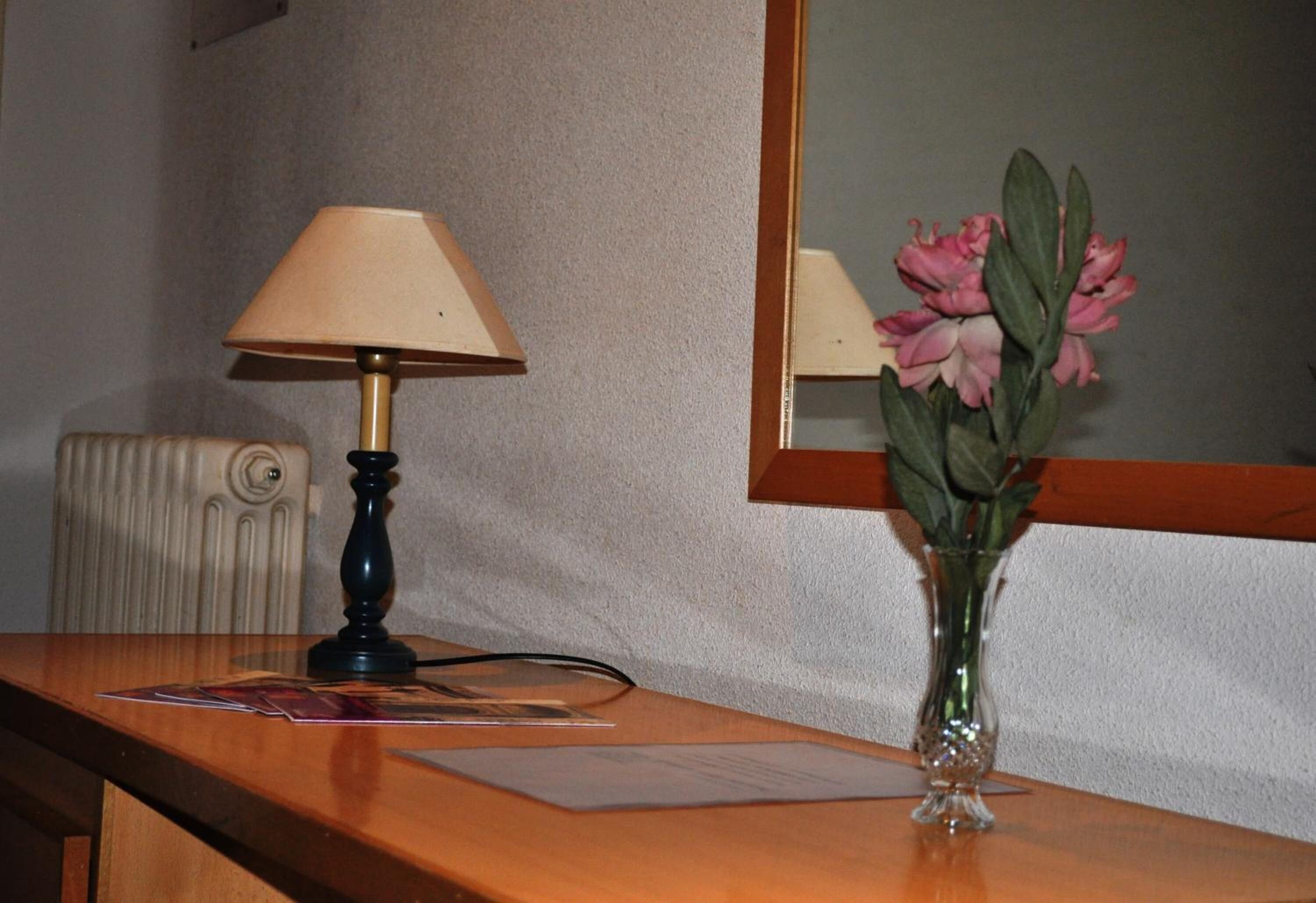 desk, blackout curtains, iron/ironing board, free cots/infant beds