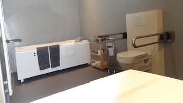 Family Quadruple Room, Garden Area | Bathroom | Shower, free toiletries, hair dryer, towels