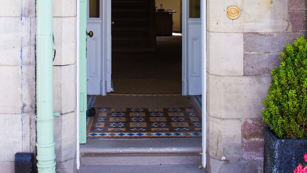 A building entrance with a sign reading "Hazeldene". - Hazeldene Guest House (Perth)
