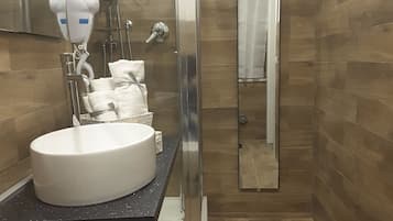 Shower, free toiletries, hair dryer, towels