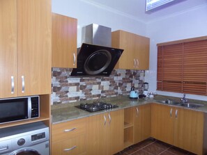 Apartment, 4 Bedrooms | Private kitchen | Fridge, microwave, stovetop, dishwasher - Signature Apartments Lagos (Lekki)