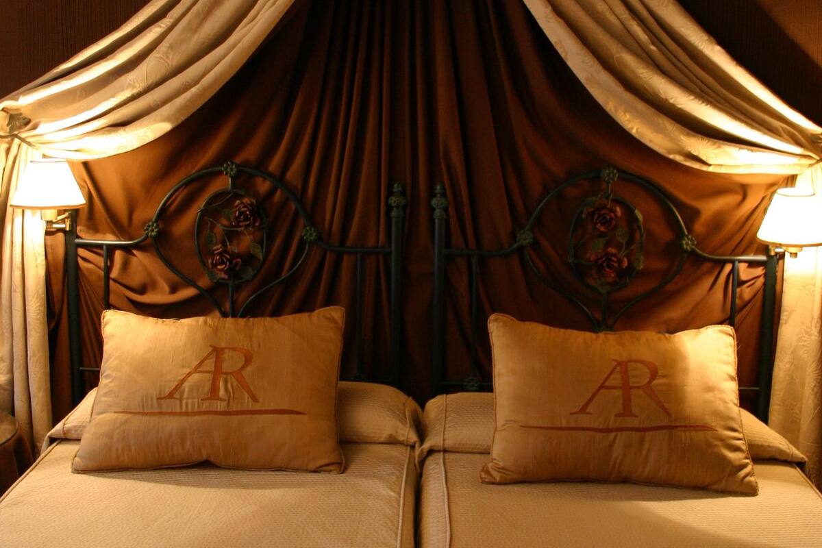 Double Room | Minibar, in-room safe, desk, blackout drapes