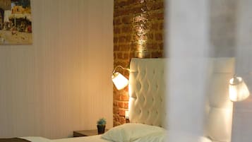 Quarto família, várias camas | Roupas de cama premium, frigobar (abastecido com alguns itens grátis)