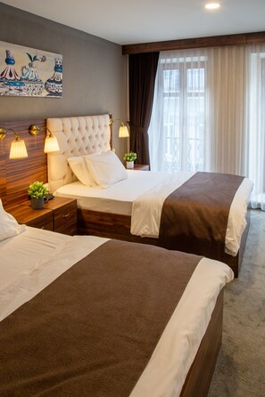 Family Room | Premium bedding, free minibar items, in-room safe, desk - Vita Suites Karakoy (Istanbul)