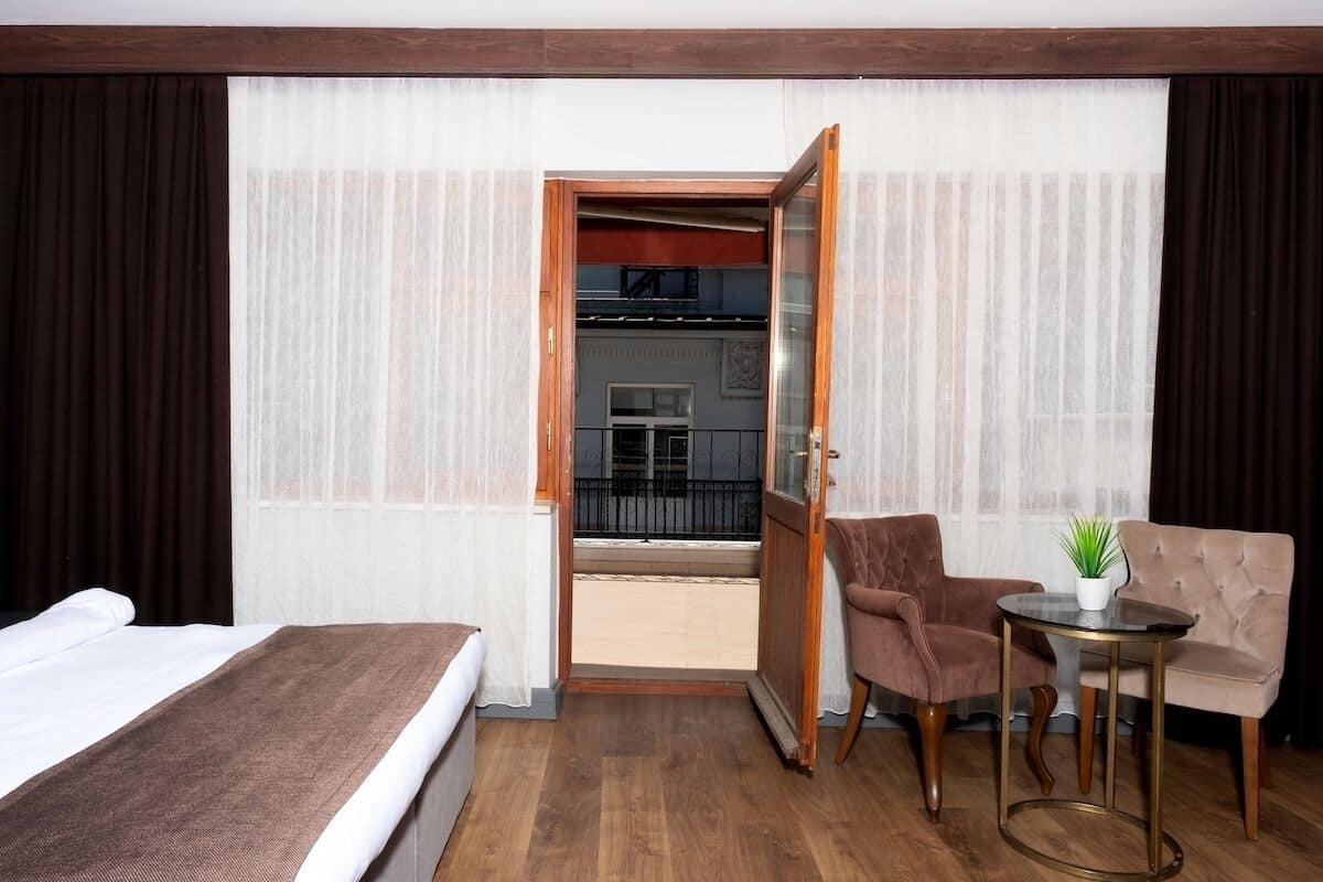 Quarto luxo, 1 cama de casal, vista para o mar | Roupas de cama premium, frigobar (abastecido com alguns itens grátis)