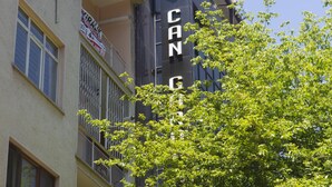 A hotel with a sign for 'CAN GREEN HOTEL SPA' and a visible balcony. - Can Grand Hotel  (Ankara)