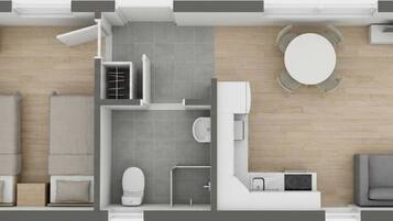 A hotel room layout with a bed, a sofa, a small table, a bathroom, and a round table.