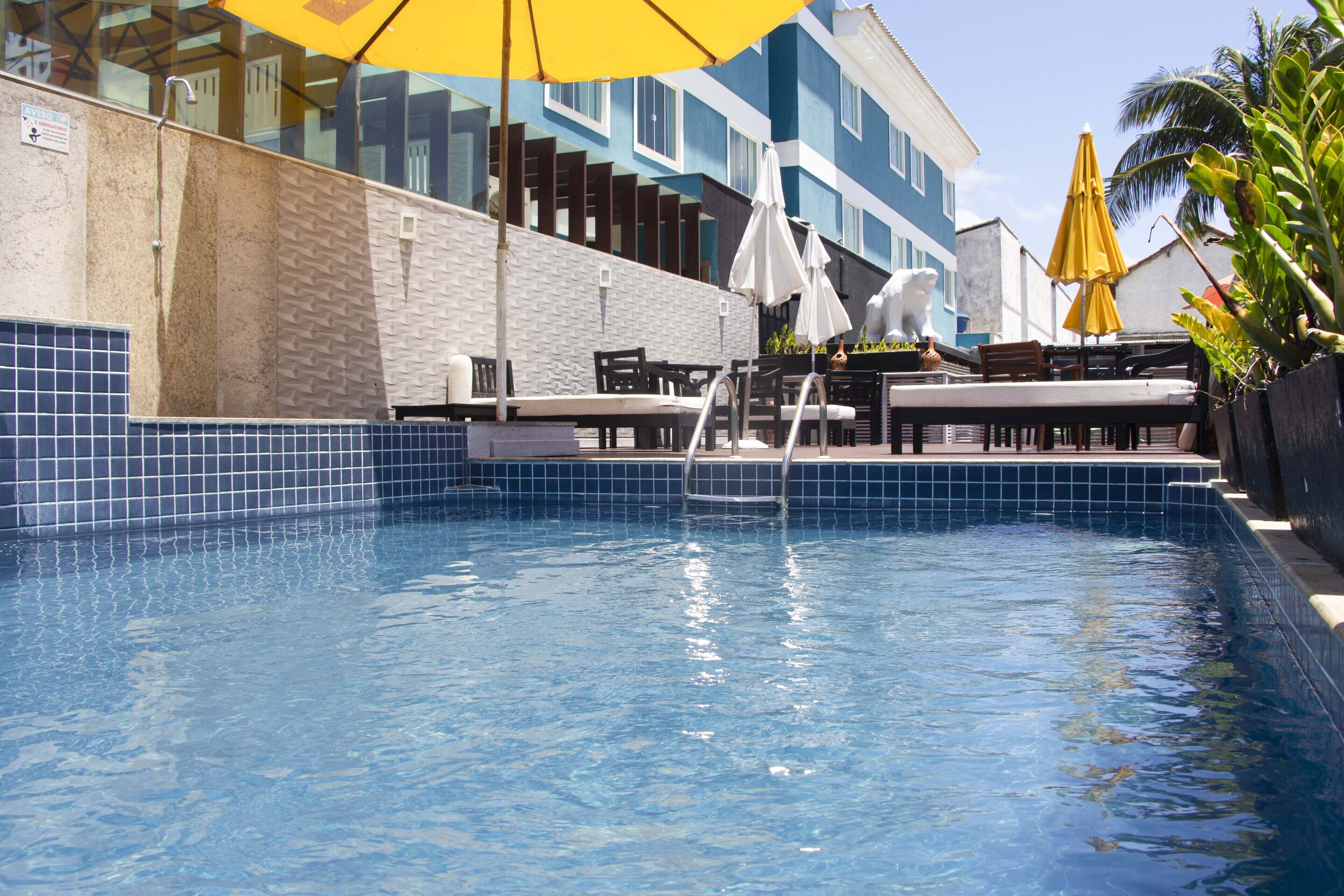 outdoor pool, open 10:00 am to 6:00 pm, pool loungers