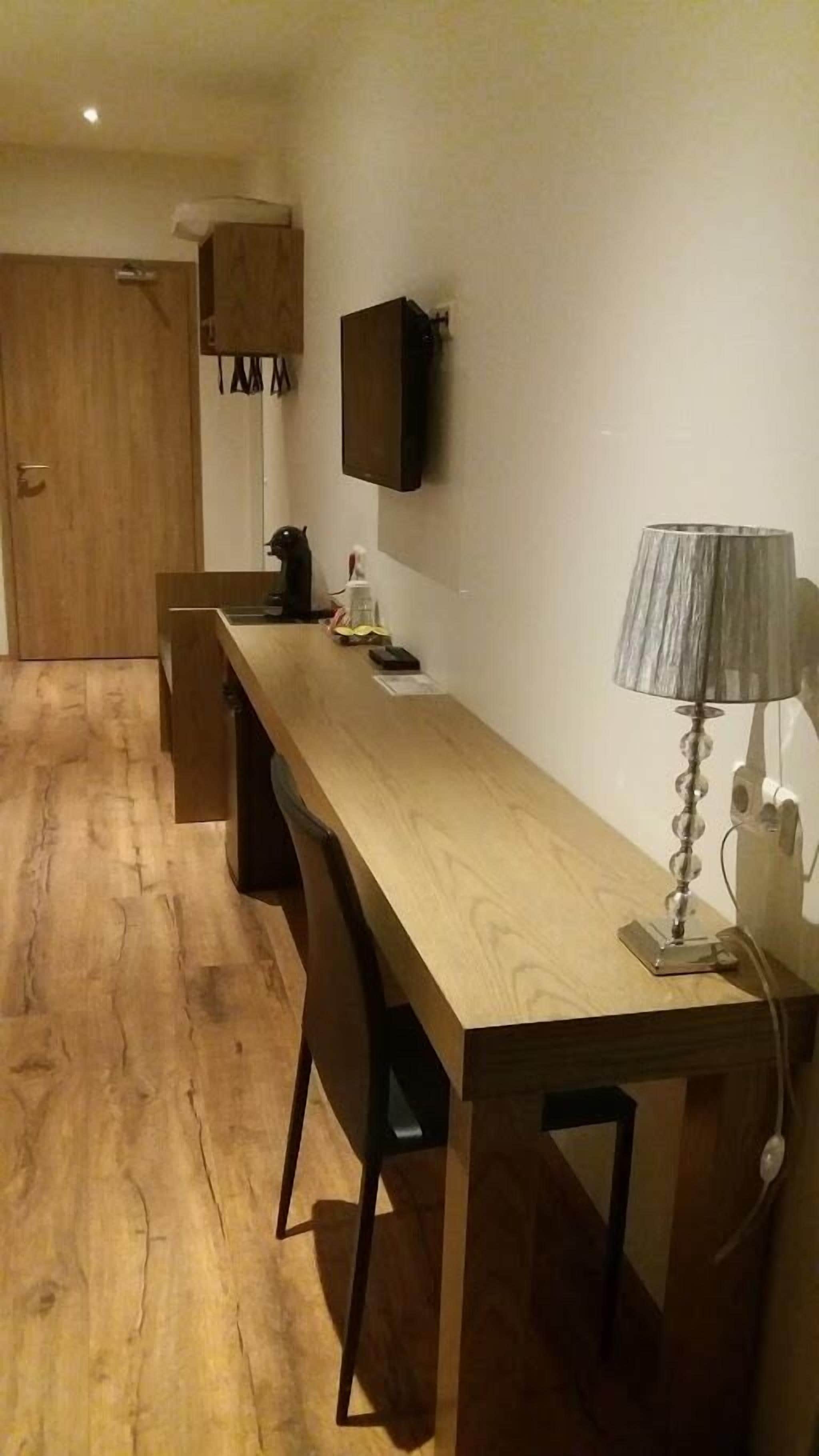 double or twin room, private bathroom | living area | flat-screen tv