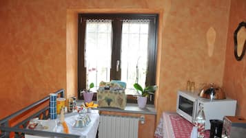 Double Room, Balcony, City View | Coffee and/or coffee maker
