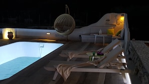 Seasonal outdoor pool, pool umbrellas, pool loungers