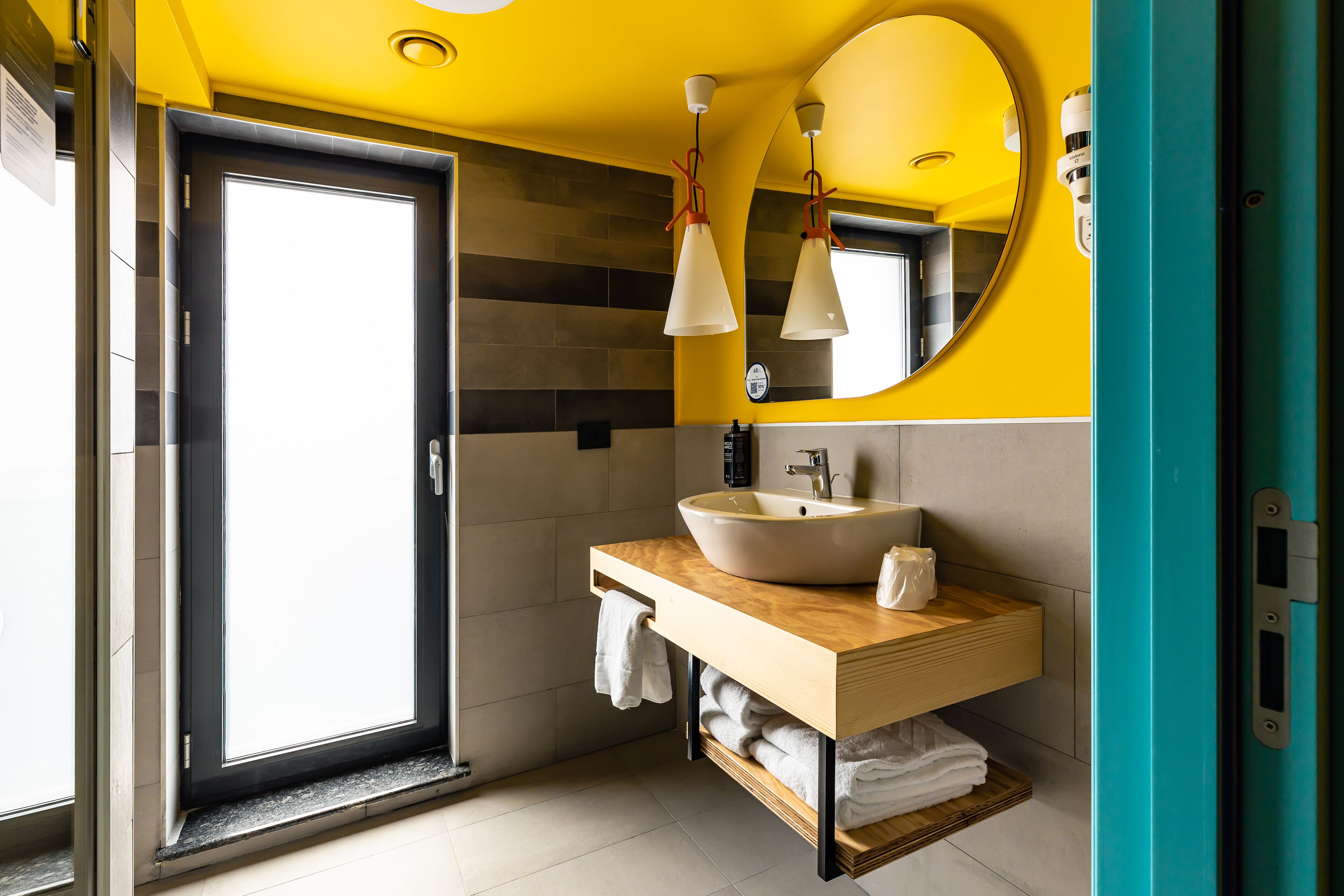 eco-friendly toiletries, hair dryer, towels