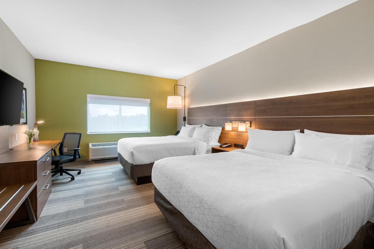 Premium bedding, down comforters, pillowtop beds, in-room safe