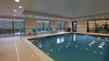 Indoor pool, open 7:00 AM to 10:00 PM, pool loungers