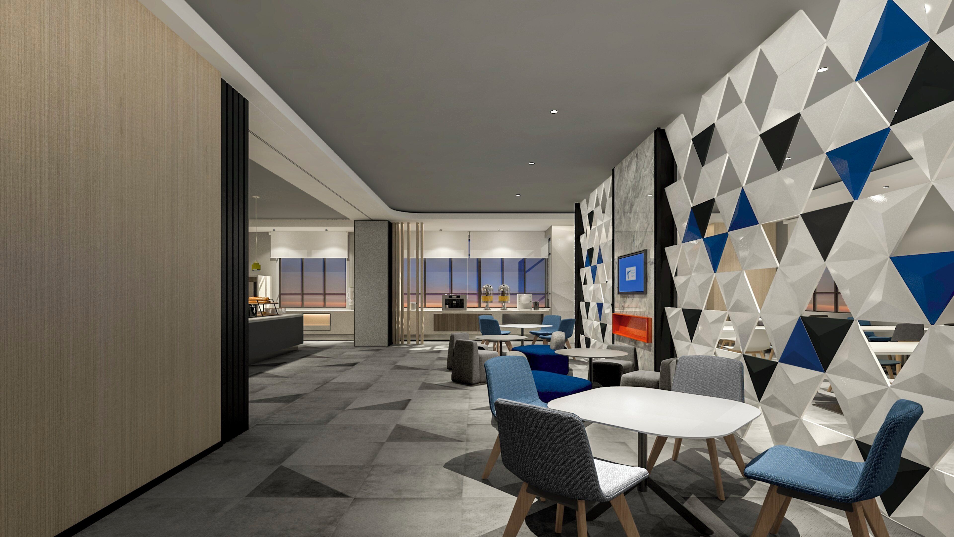 Un interior moderno con comedor, cocina y espacio de estar.