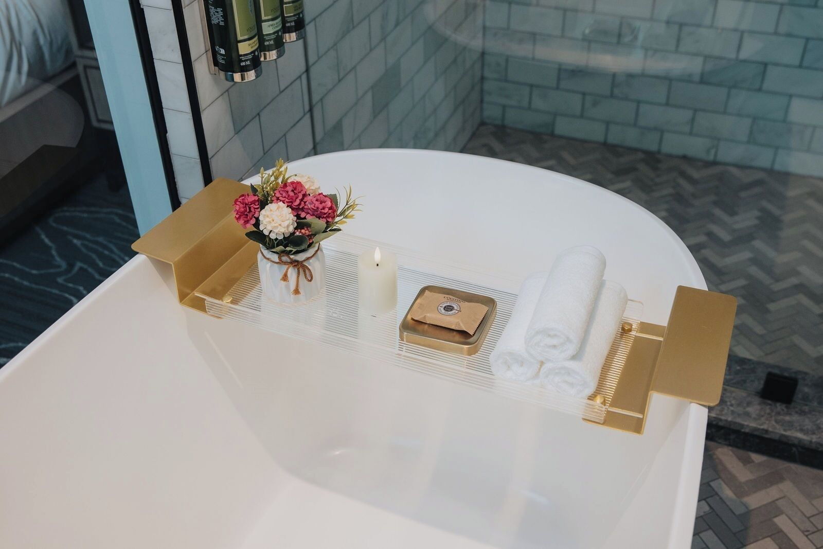 pender suite - dividend floor | bathroom | designer toiletries, hair dryer, bathrobes, slippers