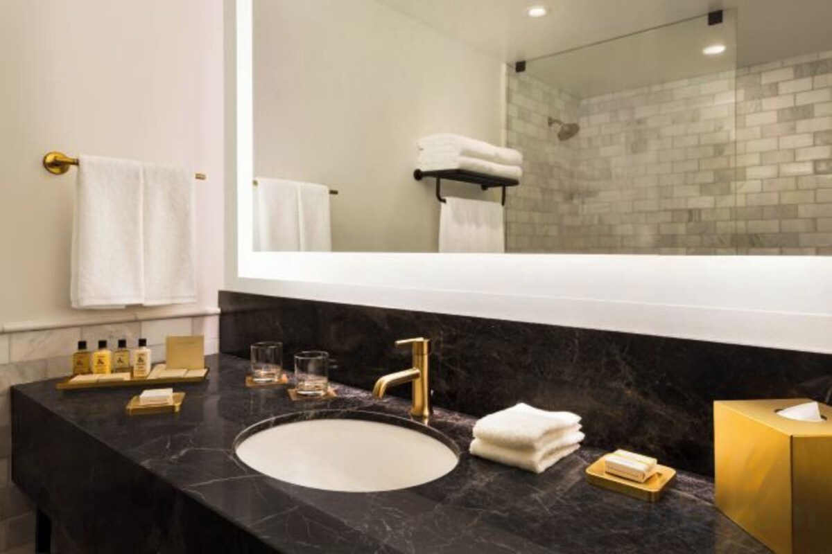 Designer toiletries, hair dryer, bathrobes, slippers