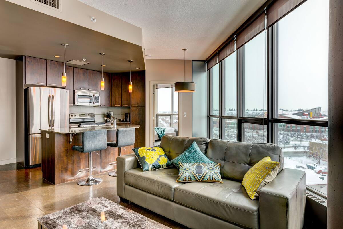 Suite, 1 Queen Bed | Living area | Flat-screen TV