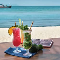 3 bars/lounges, poolside bar, beach bar