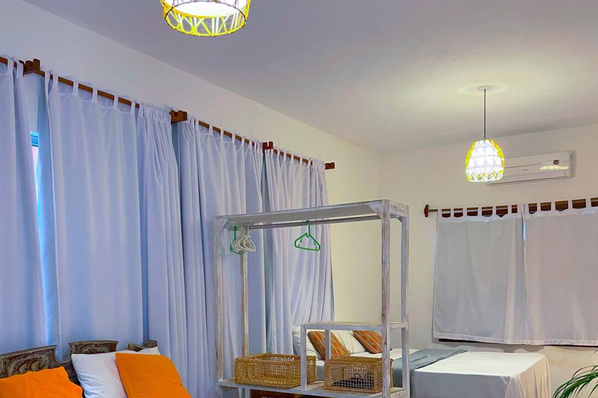 Family Triple Room | Blackout drapes, iron/ironing board, free WiFi, bed sheets