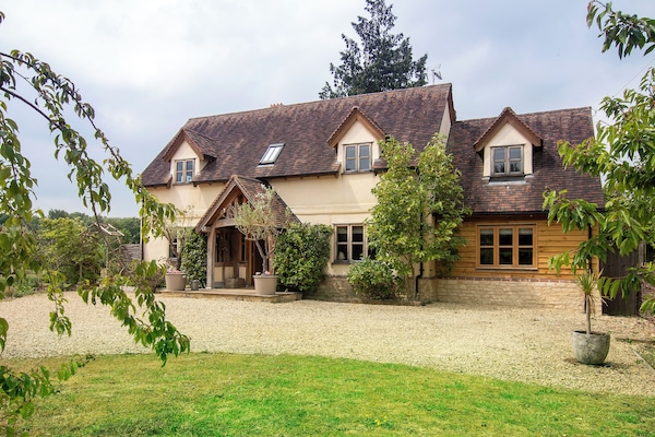 Front of cottage secure gated drive , plenty of parking and EV charger
