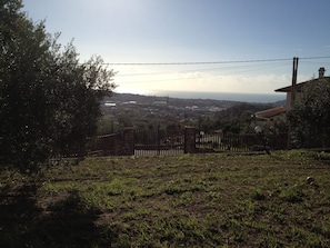 Surrounded by rolling hills and a serene landscape, this property offers a peaceful retreat.