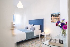 4 bedrooms, desk, iron/ironing board, travel cot
