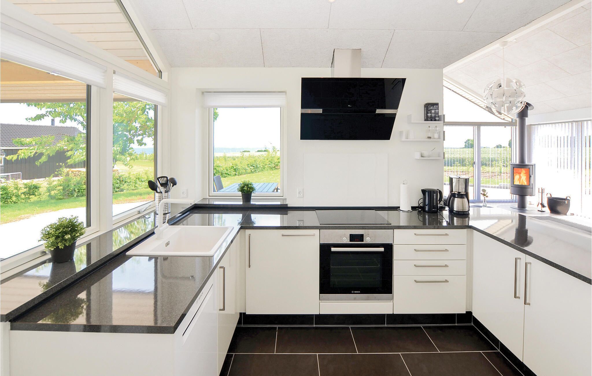 Fridge, stovetop, dishwasher, coffee/tea maker