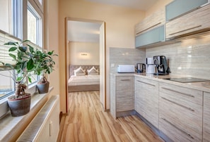 Fridge, coffee/tea maker, electric kettle, toaster