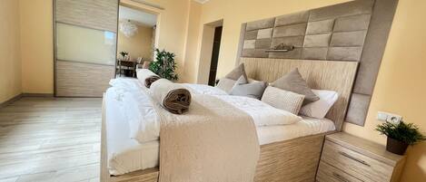 2 dormitorios, tabla de planchar con plancha, cuna de viaje y wifi