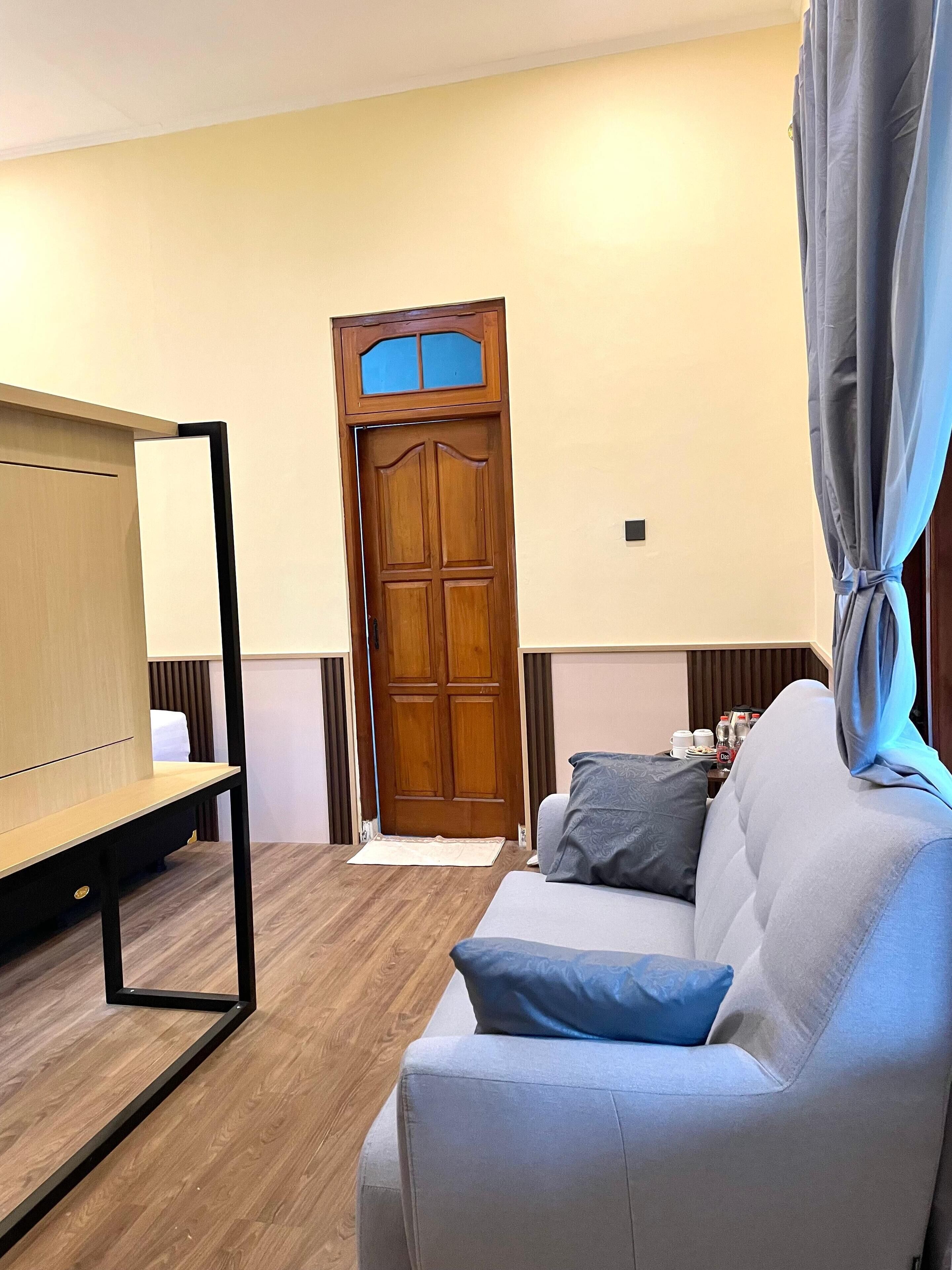 Suite, 2 Double Beds | Living area