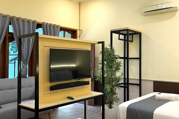 Suite, 2 Double Beds | Living area | LCD TV