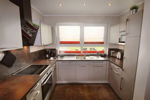 Imagen sin descripción, 5 de 20, botón