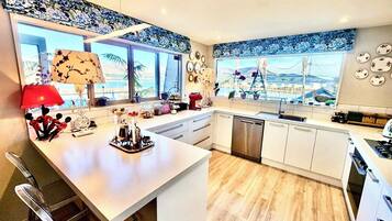 Sea and Bay views in style - Boatique House | Private kitchen | Full-size fridge, microwave, oven, stovetop
