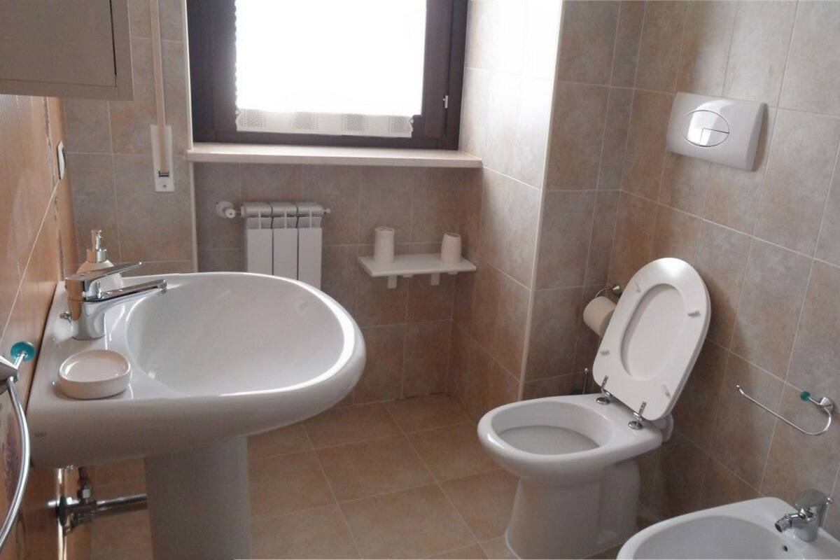 Family Apartment, 2 Bedrooms, Mountain View, Ground Floor | Bathroom | Shower, hair dryer, bathrobes, bidet