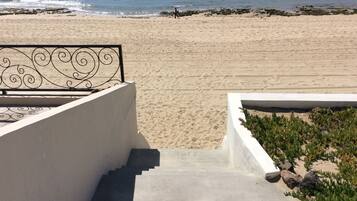On the beach, sun loungers