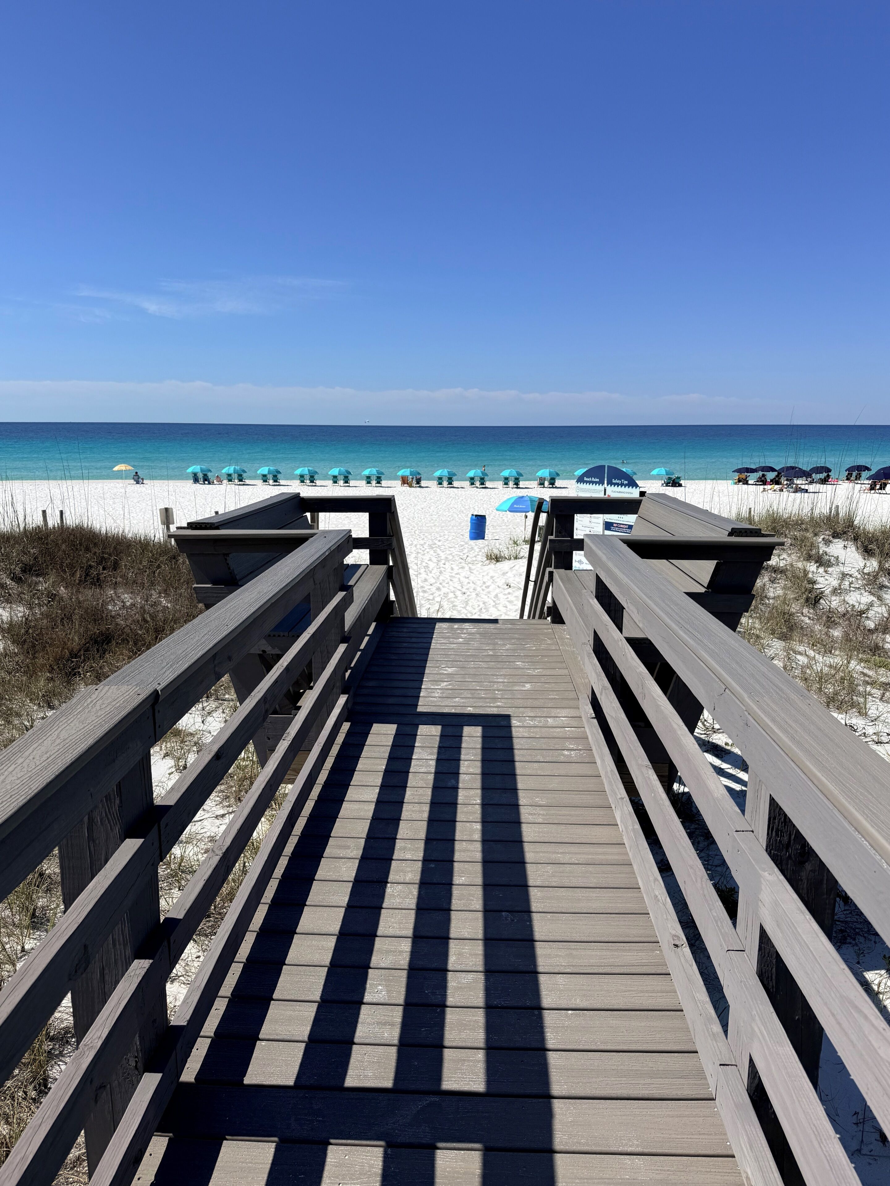 On the beach, sun-loungers