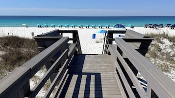 On the beach, sun-loungers