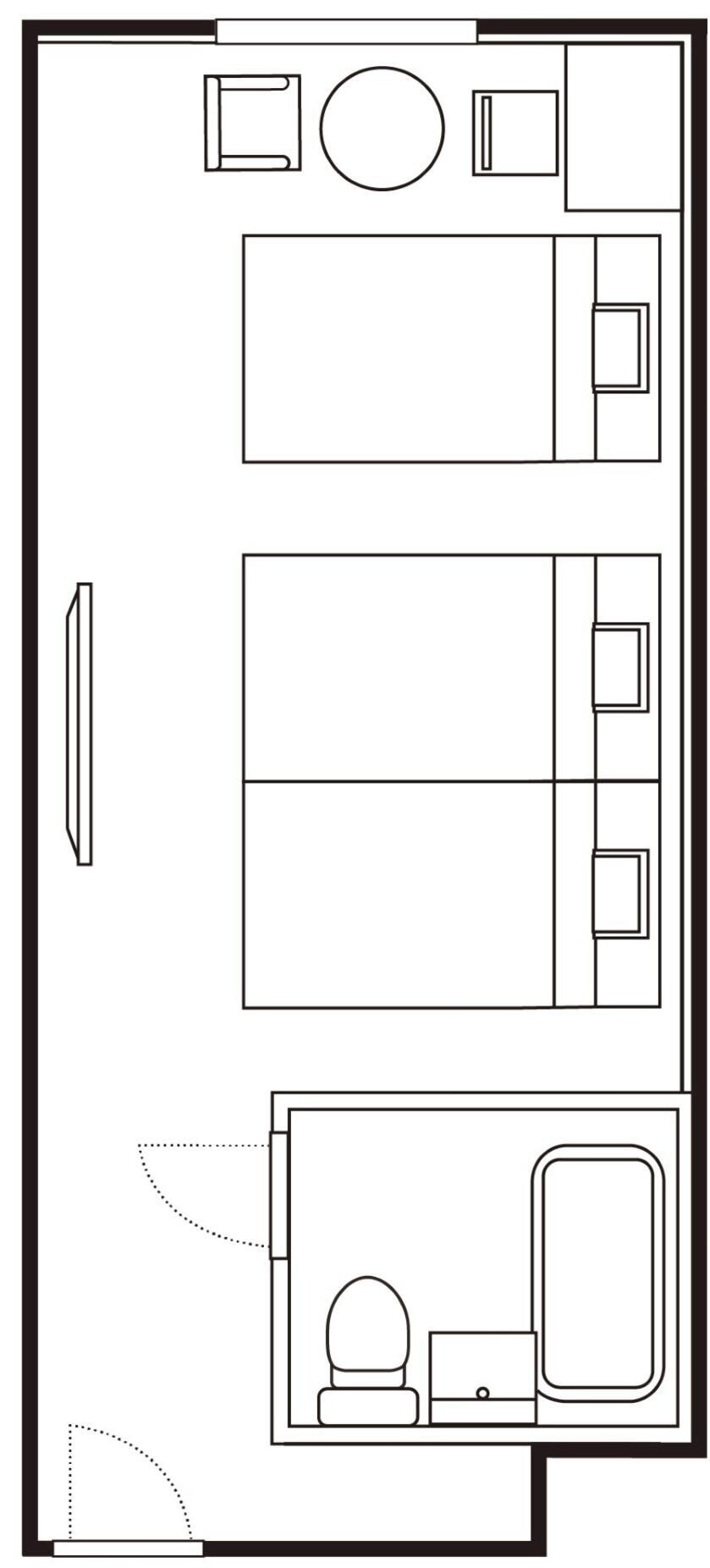 Plano de planta que muestra un dormitorio amplio, un baño, una cocina y una pequeña sala de estar.