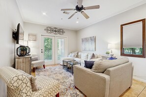 TV, DVD player, video library - Riverfront 1st fl condo -  pool & river access & walking distance to Gruene Hall (New Braunfels)